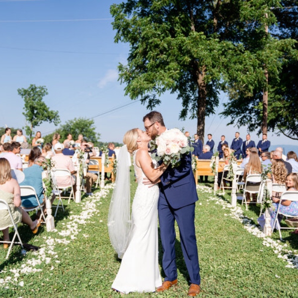 newly wed couple at the end of the aisle at east tennessee special event venue haun family farm