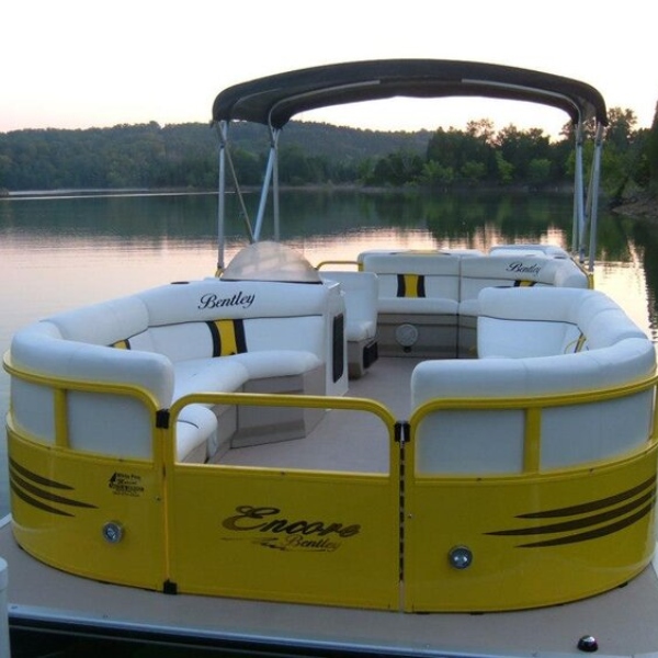 upclose of a yellow and white pontoon boat rental from smoky mountain h20 sports on douglas lake in dandridge