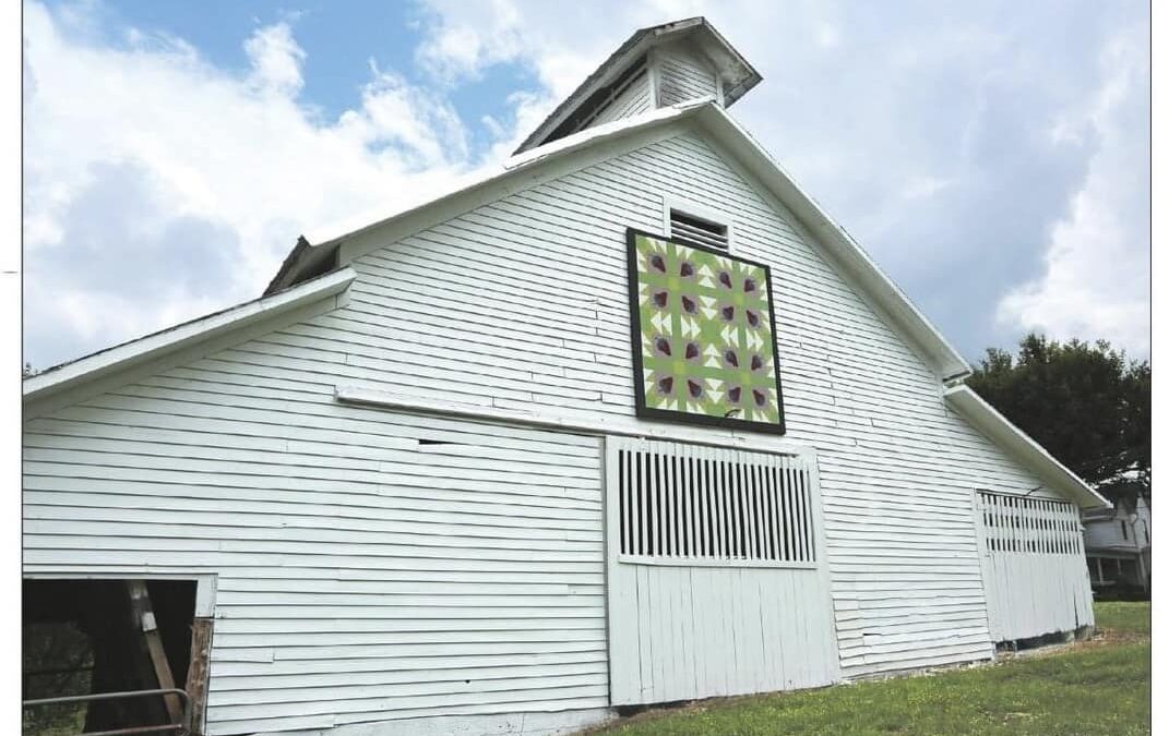 White barn with a quilt square on the front located in Jefferson County TN