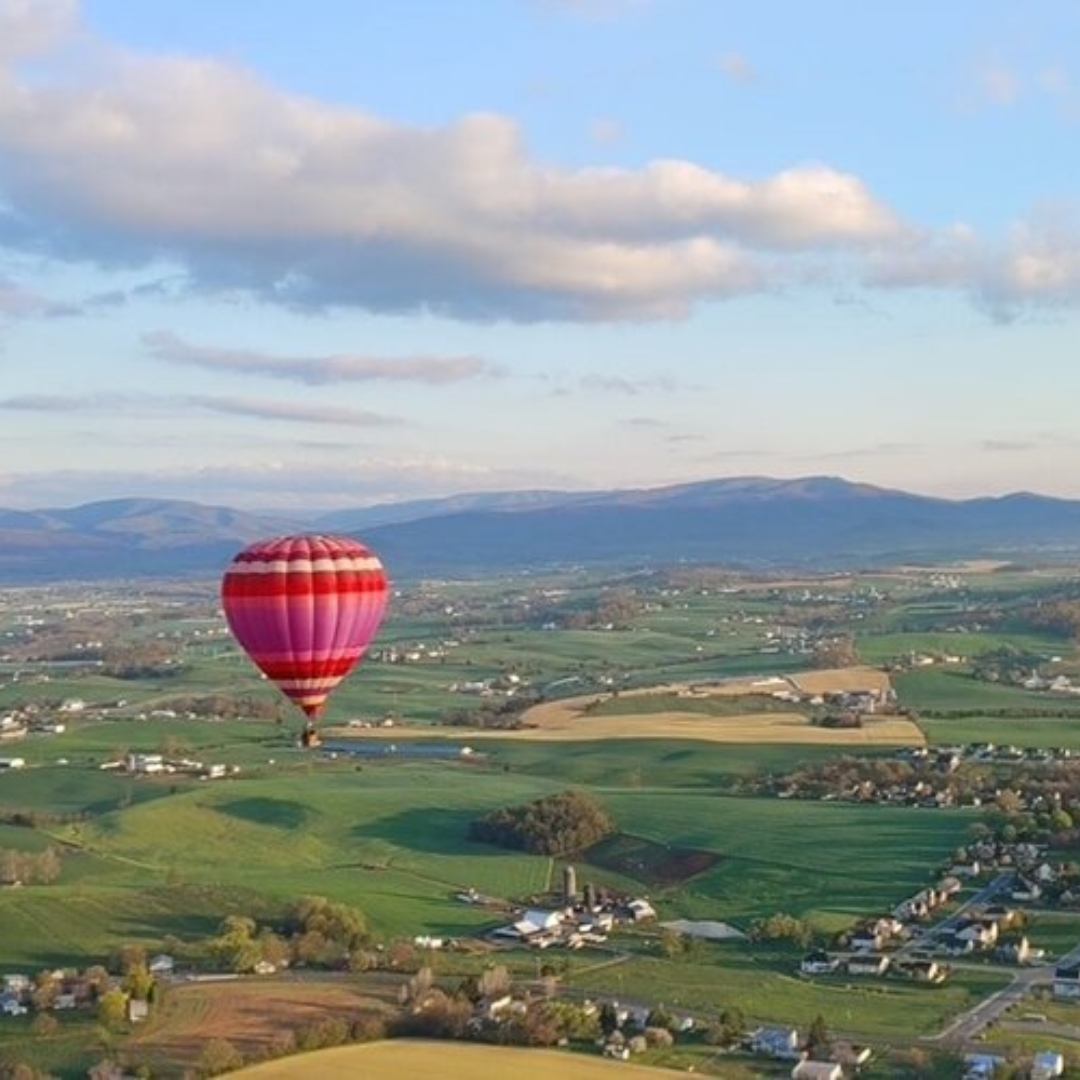 hot air balloon piloted by Adventure Time Ballooning flying over Jefferson County Tennessee in East Tennessee