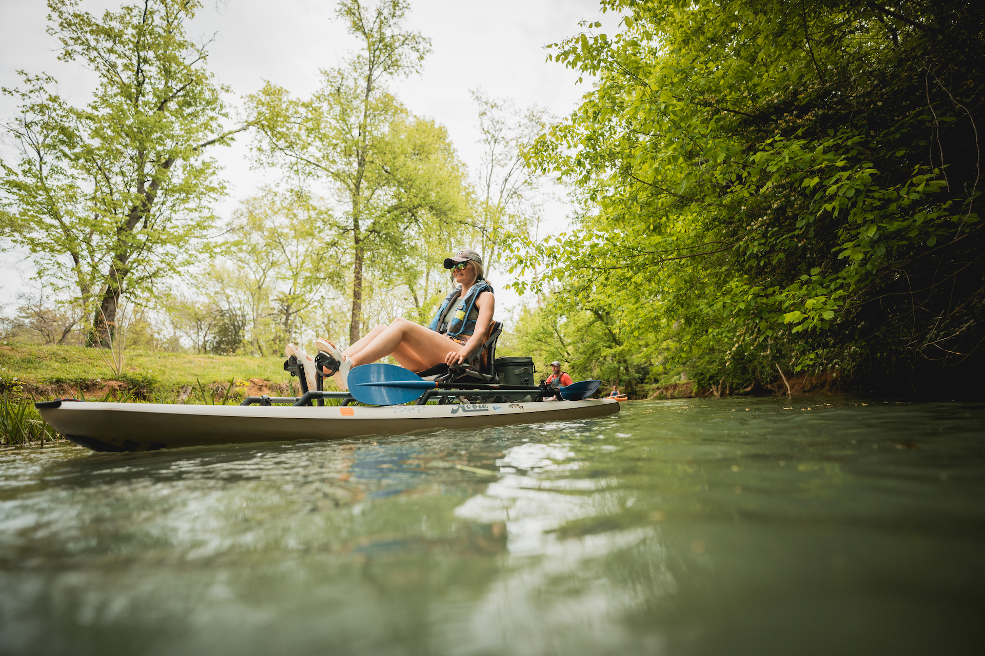 woman kayaking on Mossy Creek urban water trail